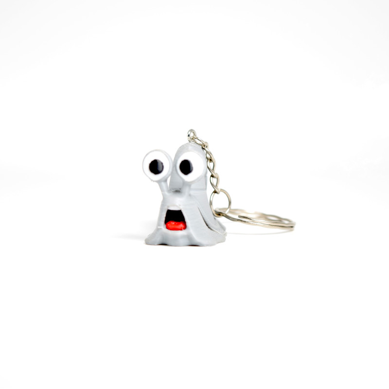Grey Snail Keychain – Flexible Toy  Bag Charm with Big Eyes